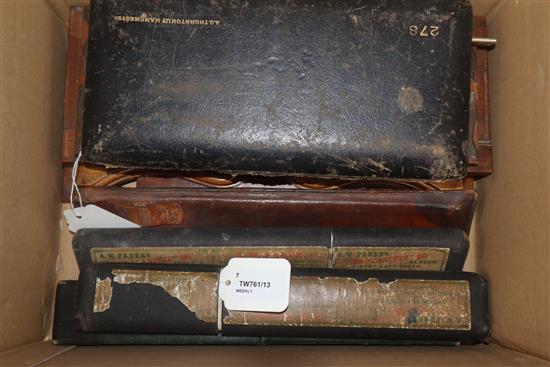 A cased set of drawing instruments by A G Thornton, four various cased slide rules and two bookslides,